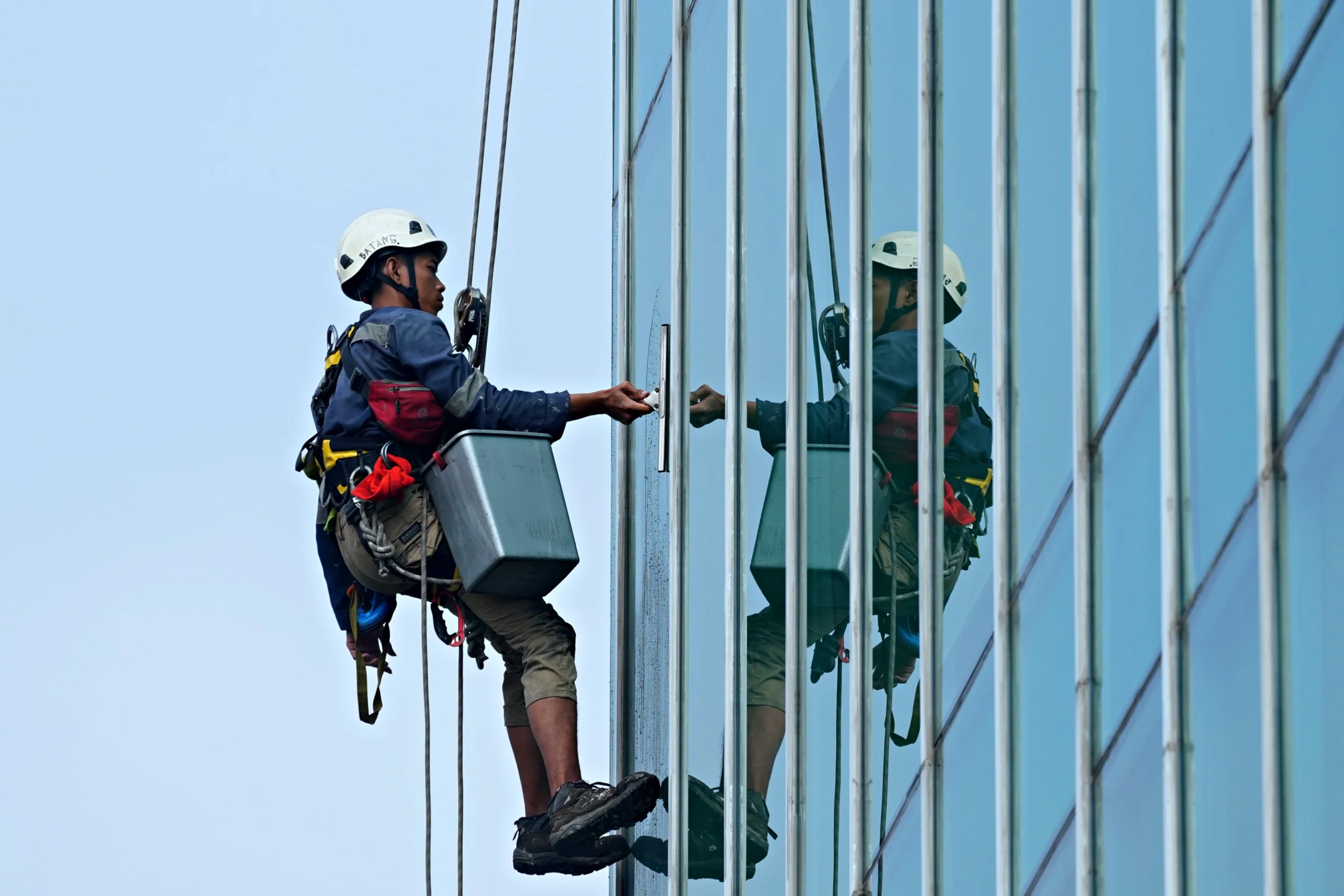 Glass facade cleaning Dubai — Spring Blue exterior window cleaning services
